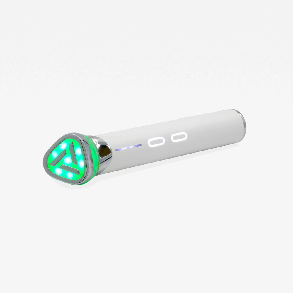 A sophisticated white electronic beauty device  featuring vibrant green lights, highlighting the luxurious 3-in-1 Lumipore Serum Booster Wand.